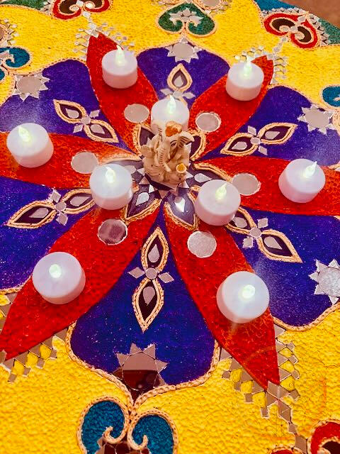 Red Flower with Ganesh - Lippan relief, clay & glass, on 24" circular wood panel - © Gold Zen Art